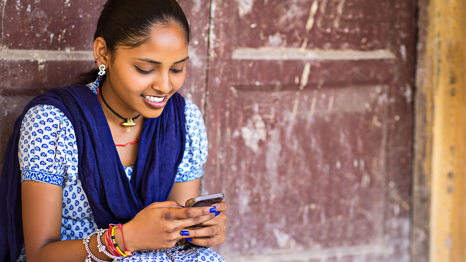 indian woman on smartphone