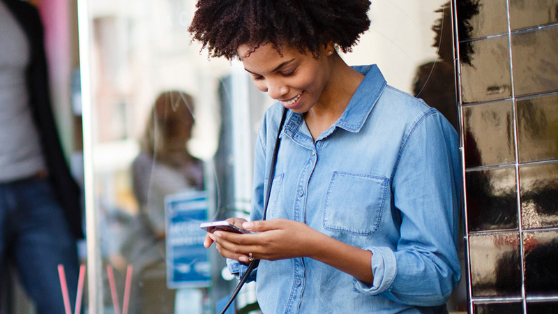 Woman looking at her cell phone