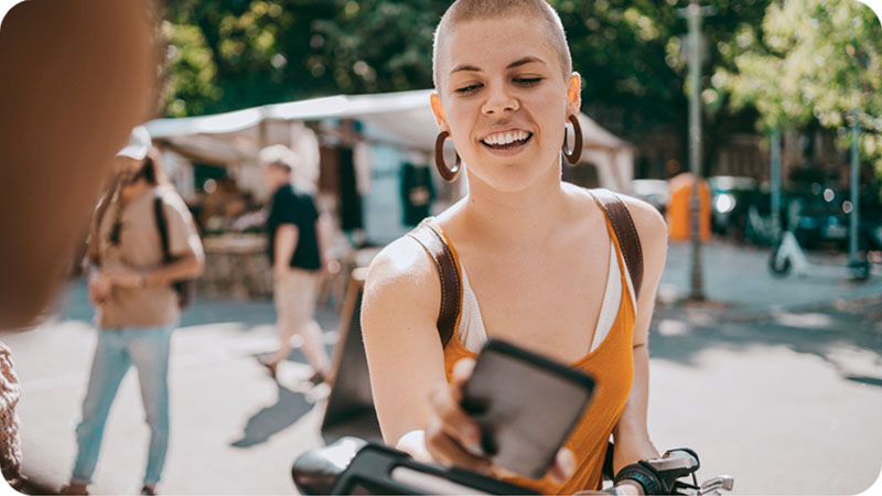 woman paying with mobile