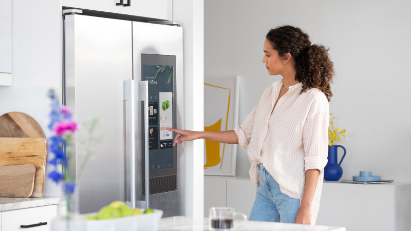 woman using fridge