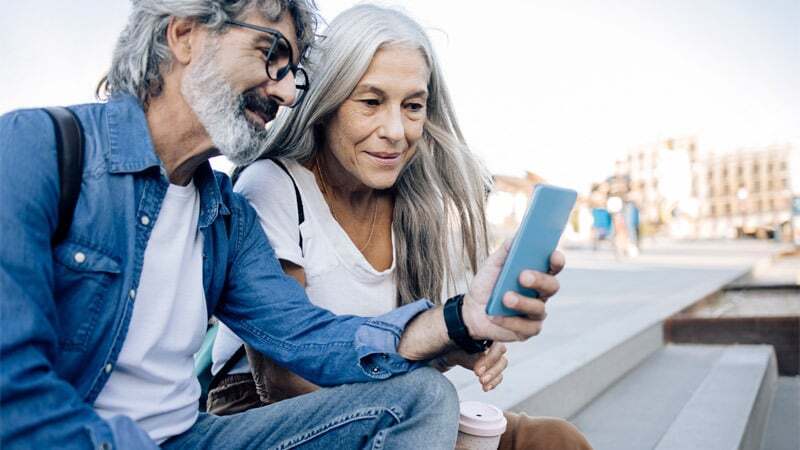 Two people on a phone