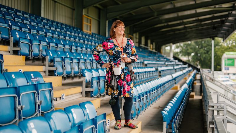 amy jones in a football stand